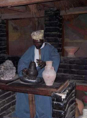 Display of an Egyptian making pottery