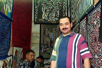 Mohamed Kamel Youssef, an Applique shop owner