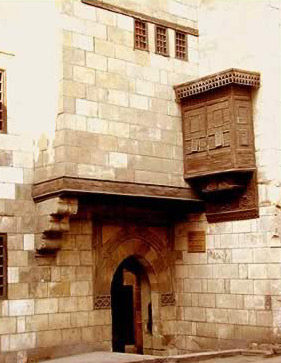 Entrance to Zeinab Khatoun showing the only Mashrabeyya on the exterior facade.