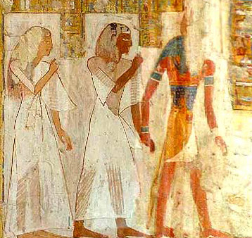The deceased couple is led by Anubis to meet Osiris