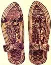 Tutankhamun's wood sandals with gold foil on stucco base